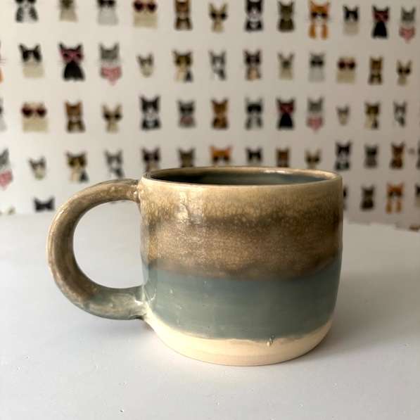 Moody beach mug