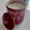Tall red jar candle