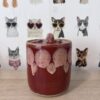 Tall red jar candle