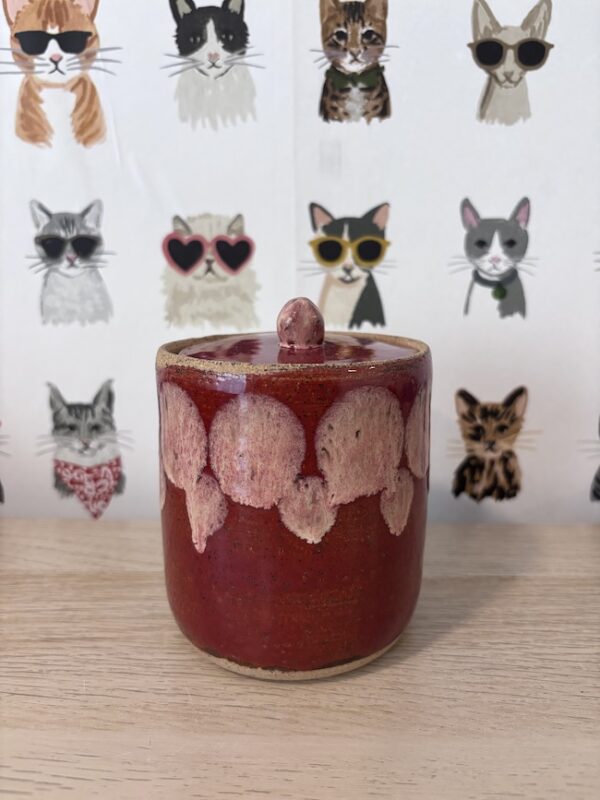 Tall red jar candle