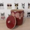 Tall red jar candle