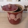 Tall red jar candle