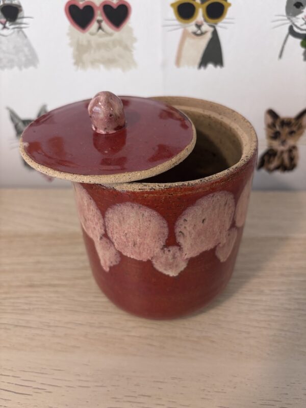 Tall red jar candle