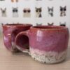 Set of 2 "running pink" speckled mugs