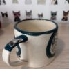 Teal "sketchy poppy" mug